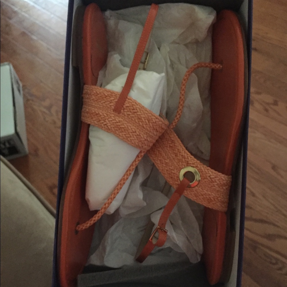 Orange sandals never worn and has original box